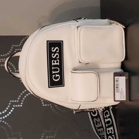 White preloved Guess Backpack. - Picture 1 of 4